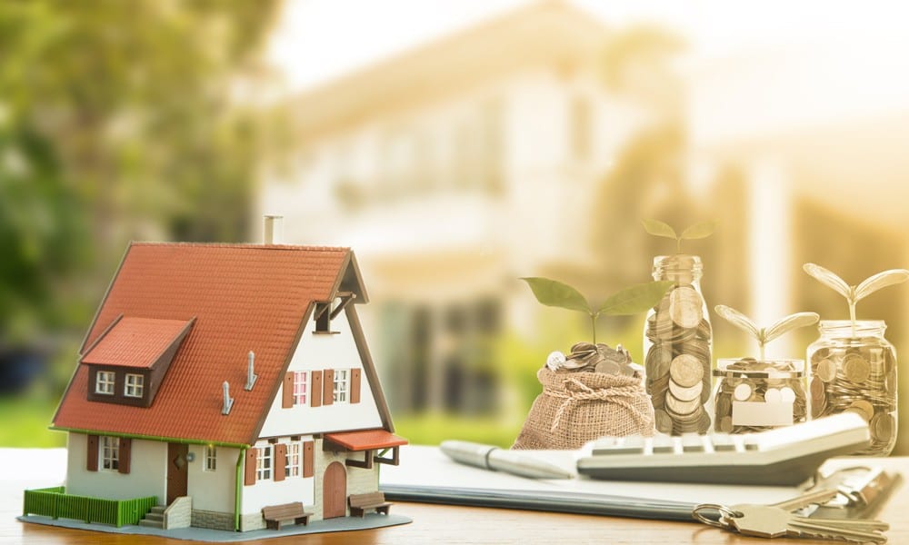 Home With Money and Calculator